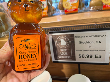 Grovetown, Ga USA - 06 22 22: Retail store Zeigler's raw local honey close up and priceのeditorial素材