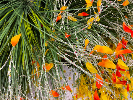 Artificial floral abstract background yellow red green spiked flowers