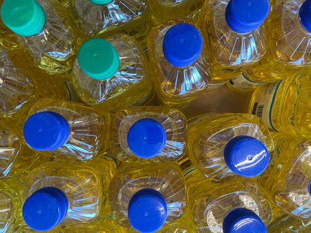 Green and blue cooking oil bottle tops flat layの写真素材