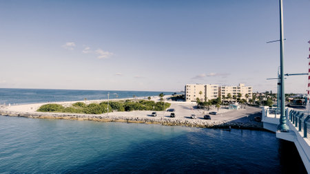 Treasure Island, Fla USA - 08 09 23: Johns Pass draw bridge overlooking resorts and oceanfront propertyのeditorial素材