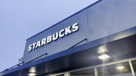 Augusta, Ga USA - 06 25 23: New Starbucks coffee restaurant top building signのeditorial素材