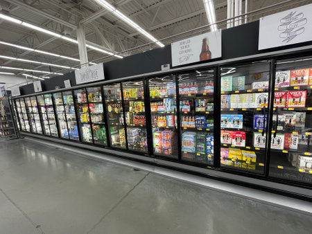Grovetown, Ga USA - 09 30 23: Beer cooler section behind glass doorsのeditorial素材