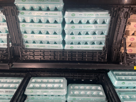 Grovetown, Ga USA - 08 06 23: Walmart grocery store Eggs section and prices crates of eggs