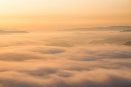 beautiful  sunrise at Phu Huai I San viewpoint with the fog, In Nong Khai province