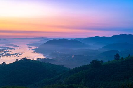 beautiful  sunrise at Phu Huai i San viewpoint with the fog, In Nong Khai province