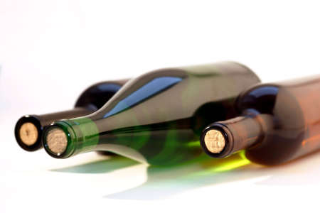 Three bottles of wine: Red, white and roseの写真素材