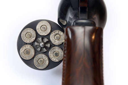 Cartridges for a handgun and a white background