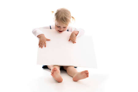 little girl and a white boardの写真素材