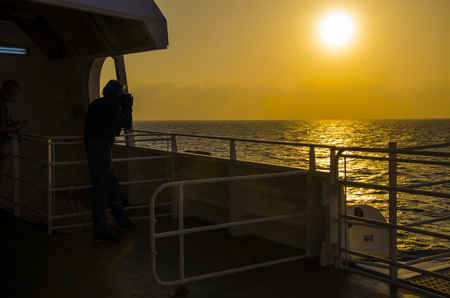 The sunsets on the Greek islands captivate tourists.の写真素材