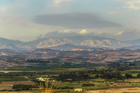 FIELDS PLANTED AND TO THE FUND MOUNTAINS IN SICILIAN TERRITORYの写真素材