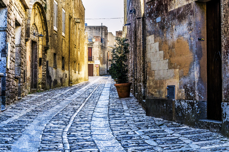 Drawing in cobblestones in the streets of the city of ericeの写真素材