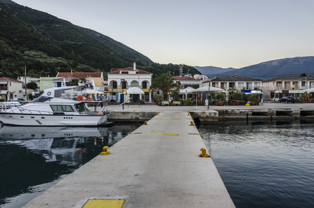 Port of Sami one of its docks then the port facilities and finally the hills of the island of Kefalonia on the Ionian Sea Greeceの写真素材