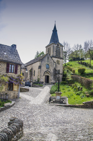 View of the church of Saint Mary of savior in the village of Belcastel, France, considered a...