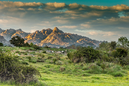 In the sierra of guadarrama in a place known as the Pedriza in the National Park of Guadarrama we see the peak the helmet on a sunset in the community of Madrid. Spainの写真素材