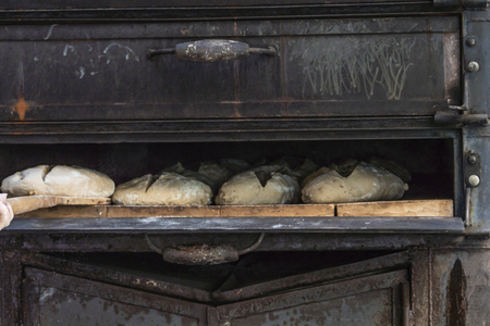 Old wood-fired oven for the artisan elaboration of bread in Olive city. Navarre Spain.の写真素材