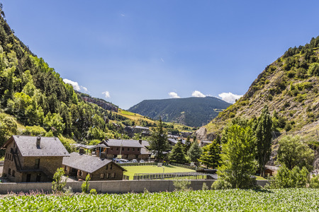 Deep valley surrounded by pine forests and tourist facilities. Andorra Europe