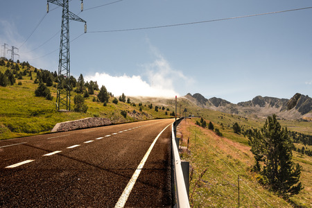 Panorama. Route crossing the Pyrenees mountains with their green slopes and plagued with pine forests. Europe Andorraの写真素材