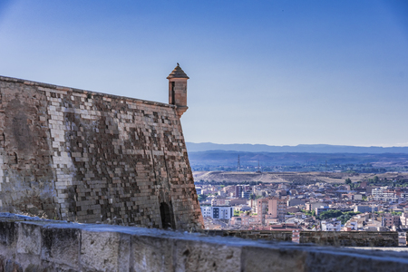 Walls and guard post of the La Suda fortress and in the background the city of Lleida. Catalonia Spainの写真素材