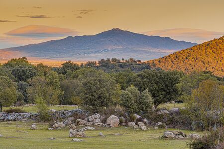 landscape last rays of afternoon sun over the mountains of the Sierra de Guadarrama. madrid Spain.の写真素材