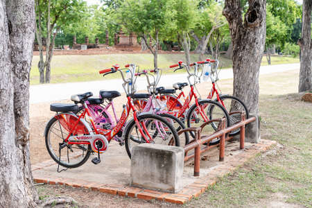 Sukhothai, Thailand-October 20, 2020: Bicycle parking for traveler traveling by bicycle into Wat Mahathat cycling around Sukhotai Historical Park,  Famous Tourist Destination in Northern Thailandのeditorial素材