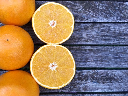 Fresh halved orange in closeup, selective focusの写真素材