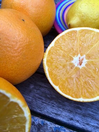 Fresh halved orange in closeup, selective focusの写真素材