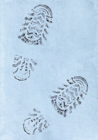 Imprint of the two traces  on a blue backgroundの写真素材