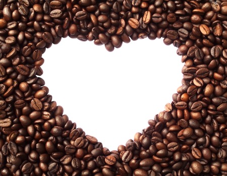 Frame in the shape of heart from coffee beans - symbolizes love, the love of coffeeの写真素材