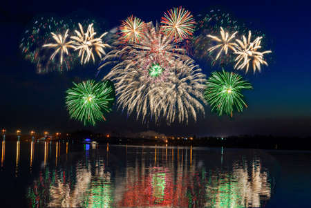 Fireworks. Salute multicolored on the black sky.