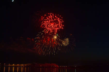 Fireworks. Salute multicolored on the black sky.