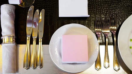 Banquet table with plates.の写真素材