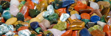 Semiprecious stones polished. Background of colorful minerals. Natural gems. The geological...