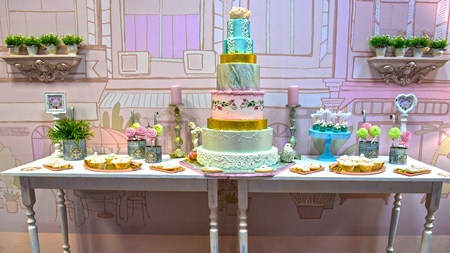 Festive table with cake and sweets.