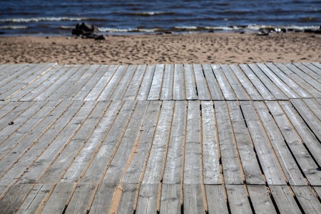 Background wooden plates gray. Natural flooring for items from planed boards. Rural design woode.