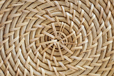 Rural weaving with natural straw. Weaving from natural plants. Ecological items for the home.