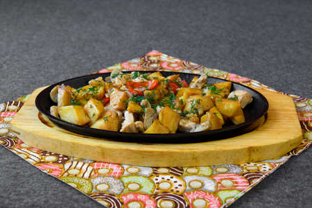 Served dish with vegetables on the table.の写真素材