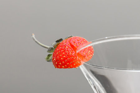 Strawberries on a wine glass.の写真素材