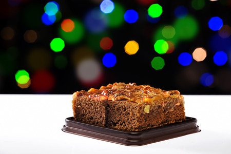 Brownies,Christmas lights in the background.の写真素材