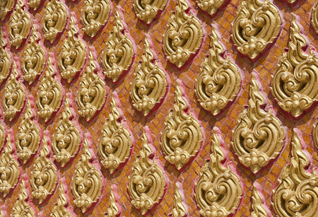 Art pattern stucco gold red temple wall backgroundの写真素材