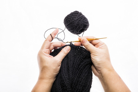Process of knitting on white background