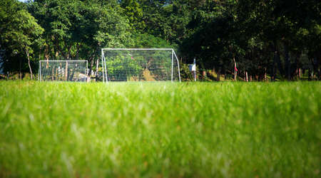 Low angle shot of a football field in the countryside