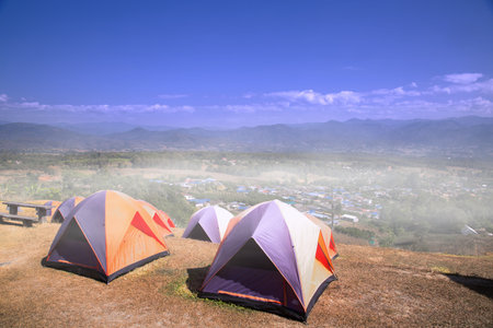 Camping tent on the hill of tourists in the morningのeditorial素材