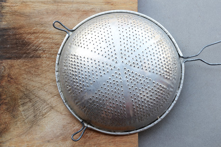 colander and boardの写真素材