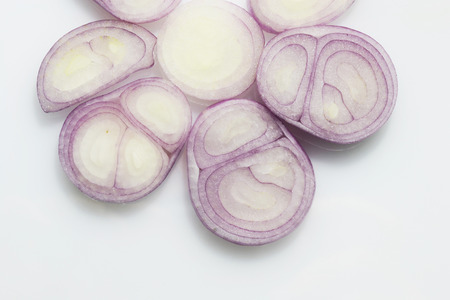 shallots slide on white backgroundの写真素材