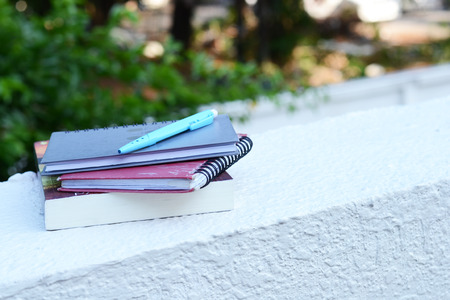 books and note on garden view