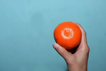 orange in handの写真素材