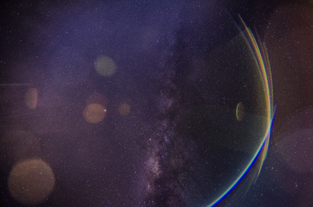 lens flear effect on milkyway drak night