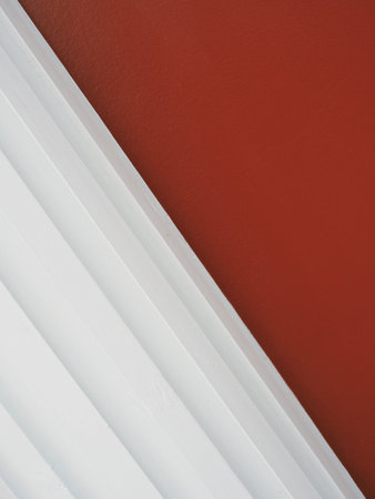 brown and white background white line and pole on wallの写真素材