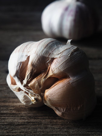 pumkin garlic shallot and spice on wood backgroud in kitchenの写真素材