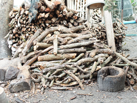 firewood in a pile on the ground in the garden, stock photoの写真素材